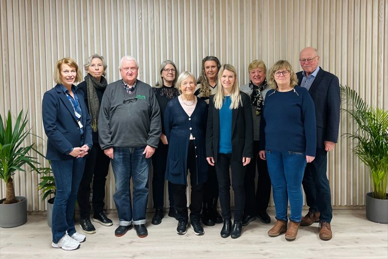 A group of people posing for a photo