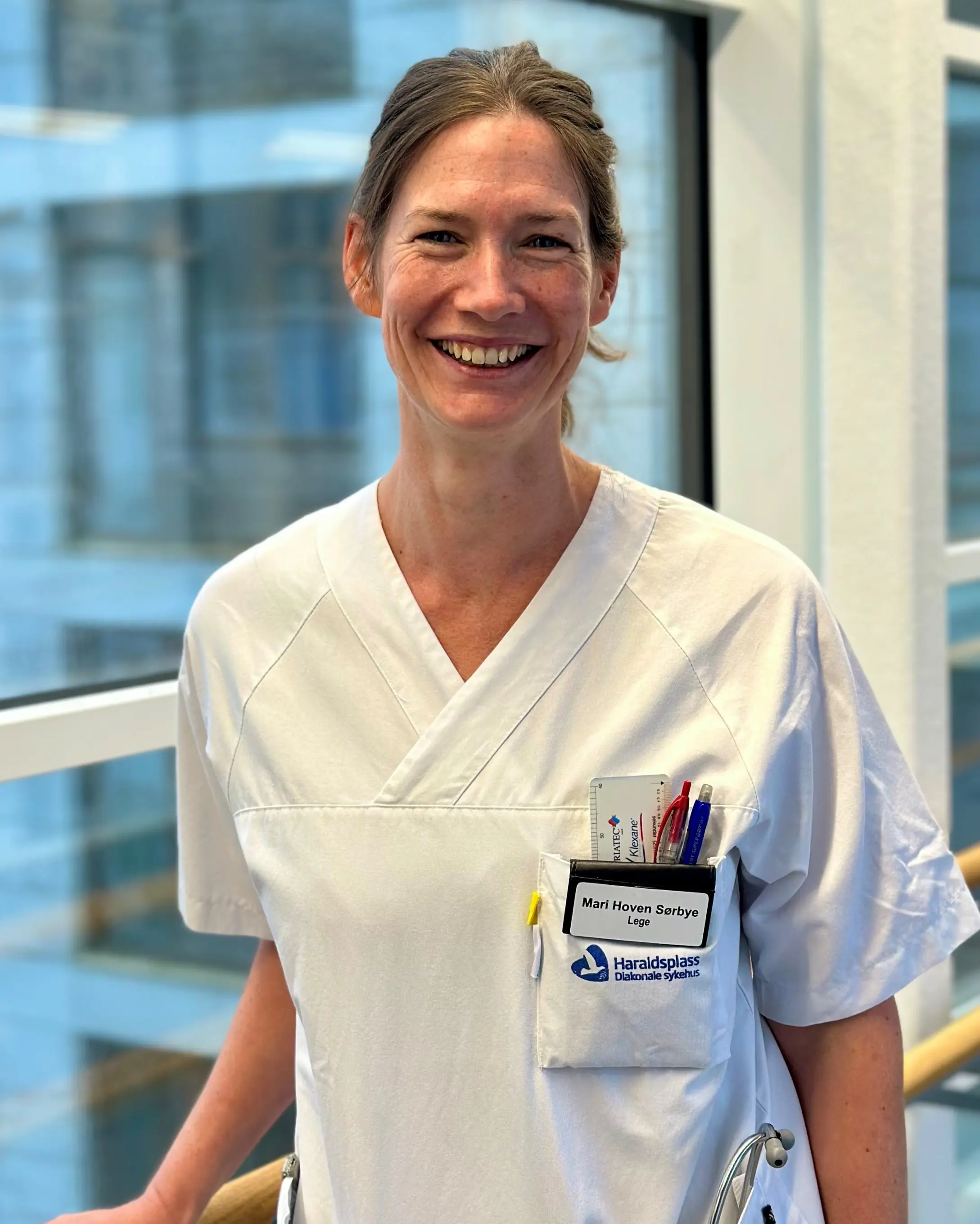 A person in a white coat