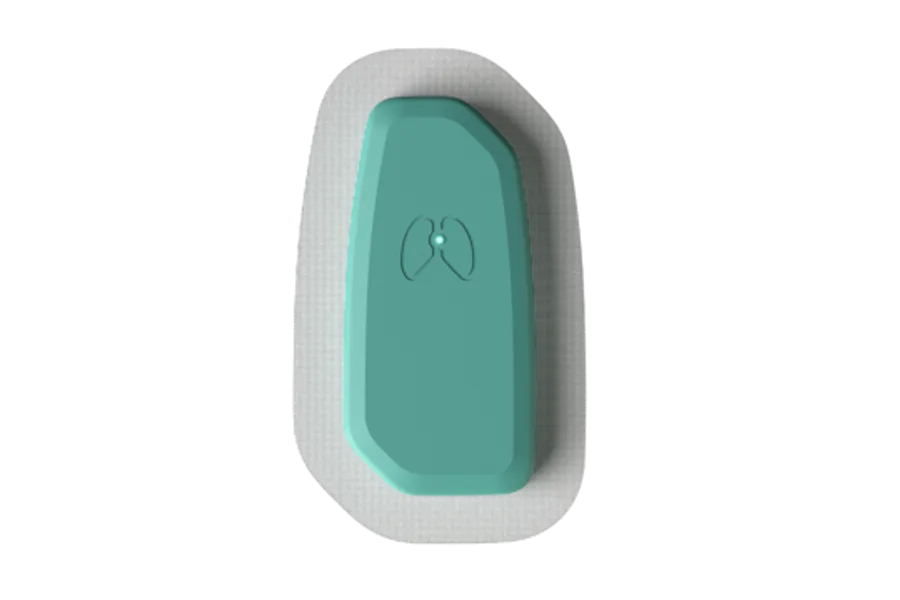 Et blått rektangel med en hvit sirkel og en svart bakgrunn