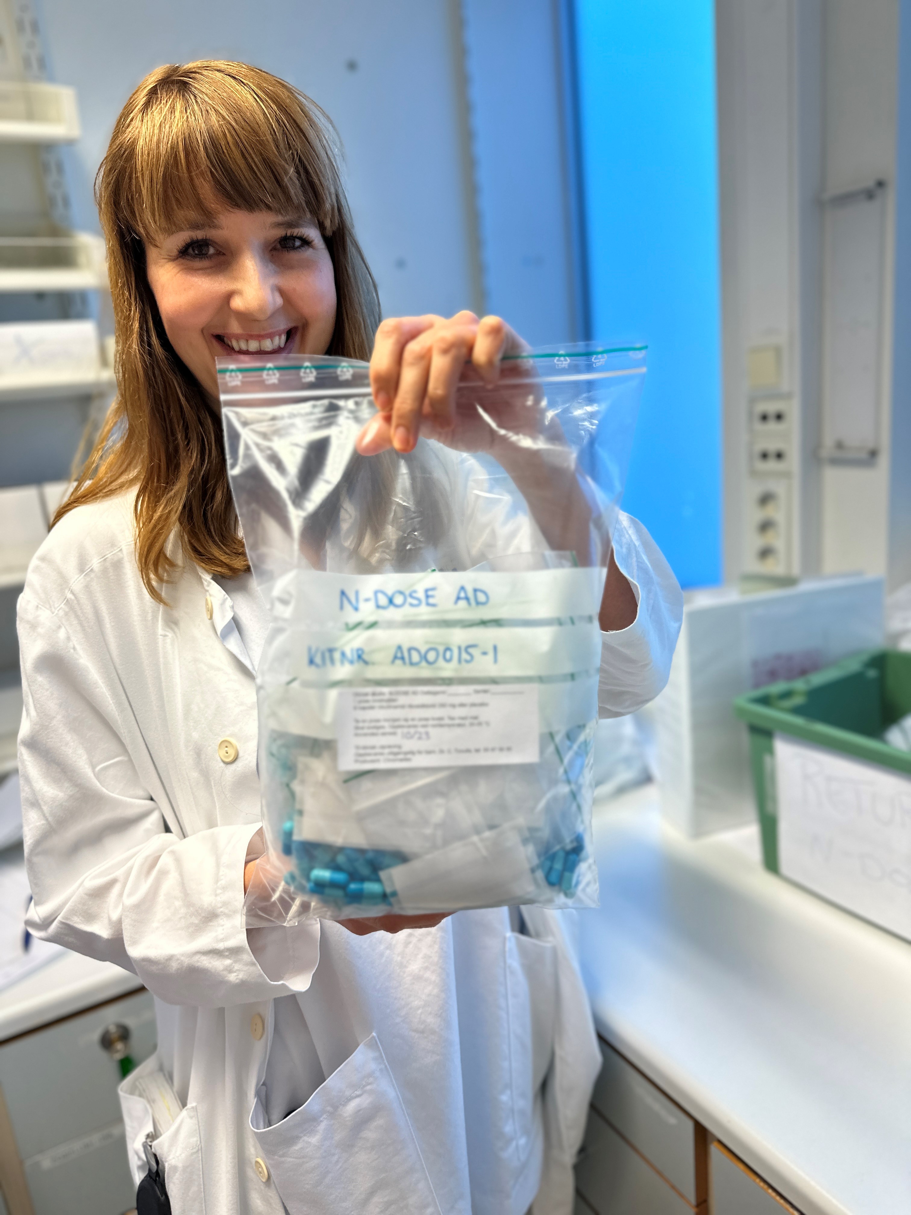 En person i en labfrakk